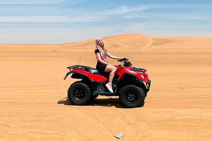 Dubai: Quad Bike, Dune Buggy, and Sandboarding Experience - Photo 1 of 6